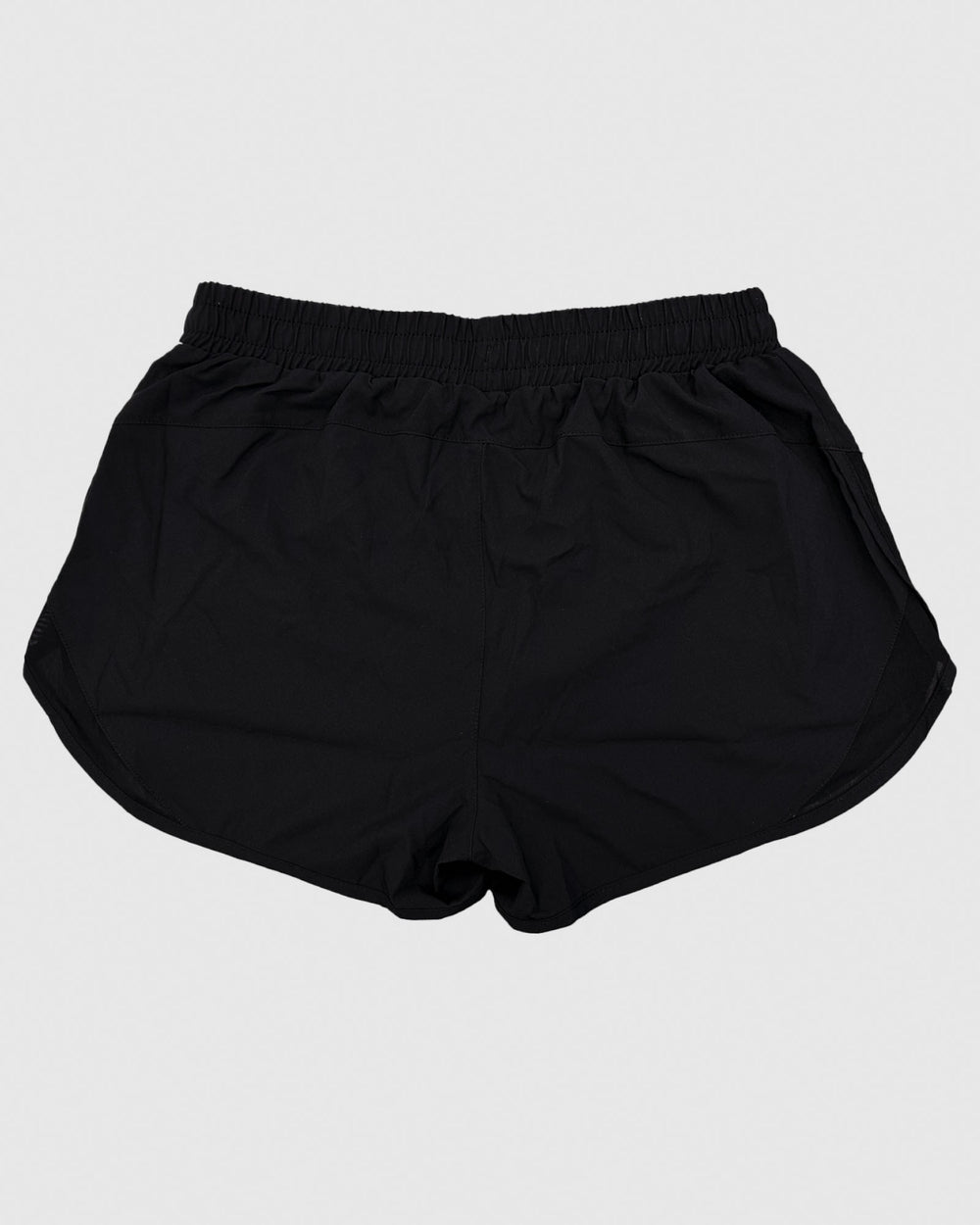 Backside of black women's athletic shorts