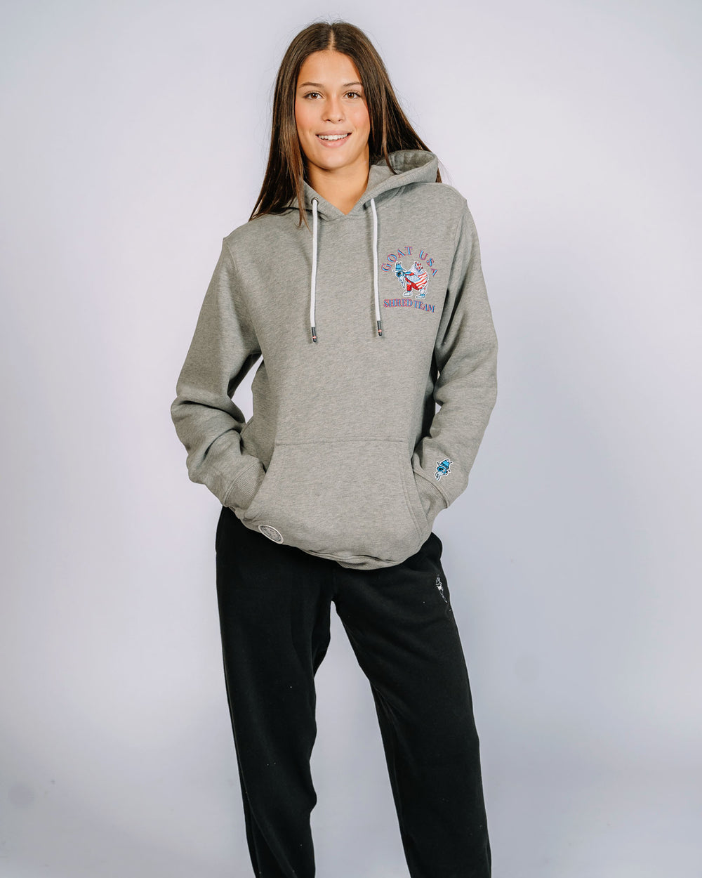 Female model wearing GOAT USA Shred Team hoodie