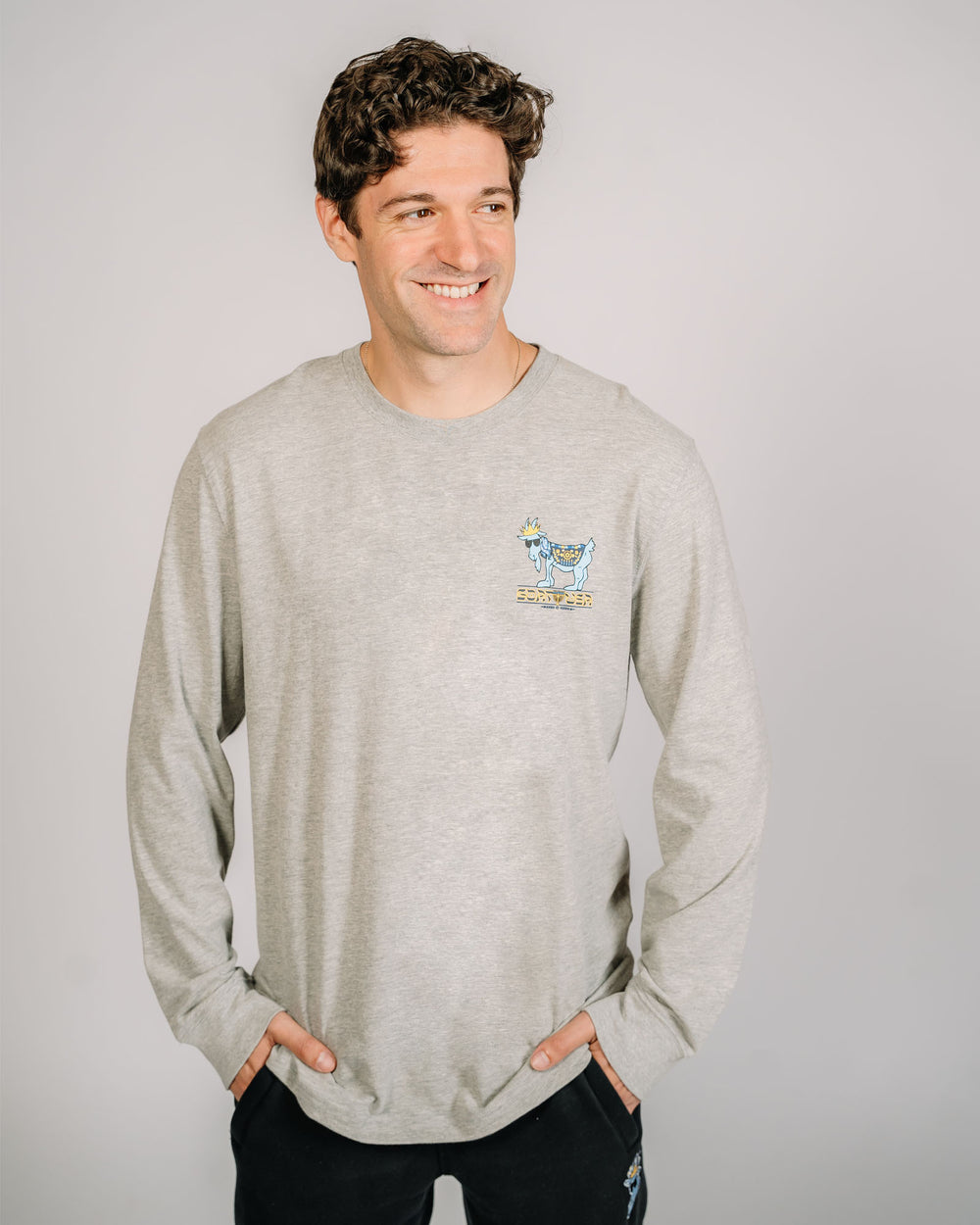 Male model wearing Hanukkah themed goat long sleeve tee